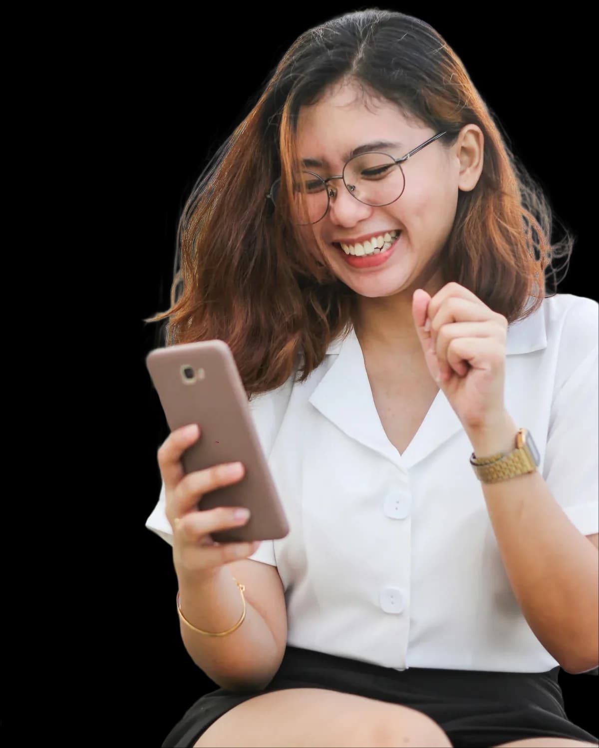 A student smiling while earning money on their phone